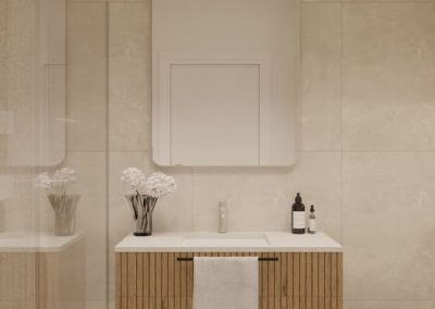 Minimalistyczna łazienka zaprojektowana przez architekta wnętrz z drewnianymi elementami i nowoczesnym wykończeniem pod klucz.